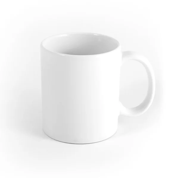 Біла чашка на сірому фоні . — стокове фото