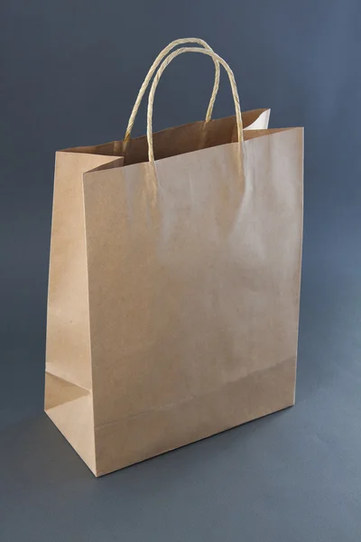 Empty Shopping Bag from craft paper — Stock Photo, Image