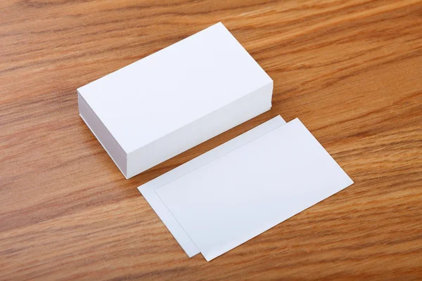 Blank business cards on a wooden background — Stock Photo, Image