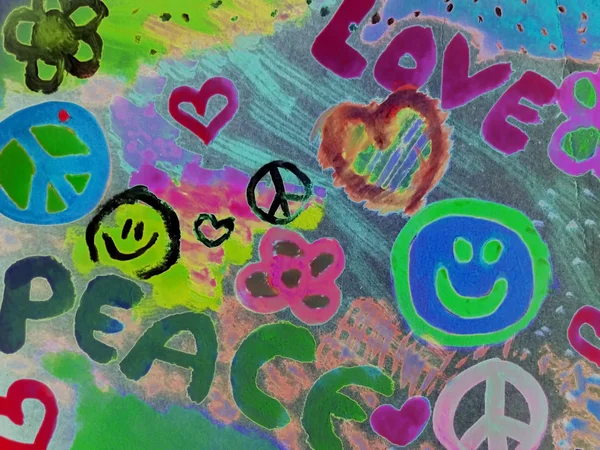 Teenager drawing "love and peace" — Stock Photo, Image