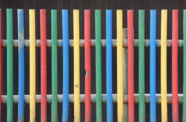 Kindergarten fence in vivid colors — Stock Photo, Image