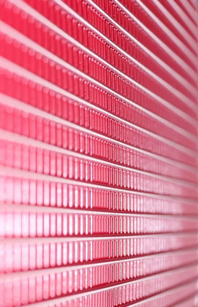 Futuristic background of spiry lines, red metal grid — Stock Photo, Image