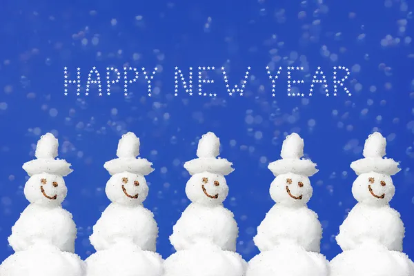Feliz Navidad y Año Nuevo mensaje, cinco muñecos de nieve sonrientes de nuevo — Foto de Stock