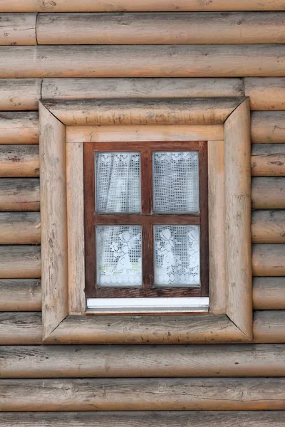 Rustic cottage window and frontside with horizontal boards — Stock Photo, Image