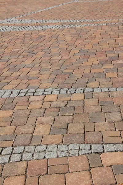 Pavement background of red and gray cobble stones — Stock Photo, Image