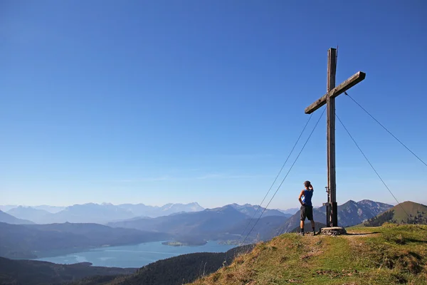 Mountain top with cross, lookout point to the alps — Stock Photo, Image