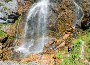 water cascade with rainbow, Dalfazer Wasserfall, near Achensee tirol