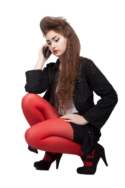 Ragazza adolescente in vestiti neri e rossi — Foto Stock