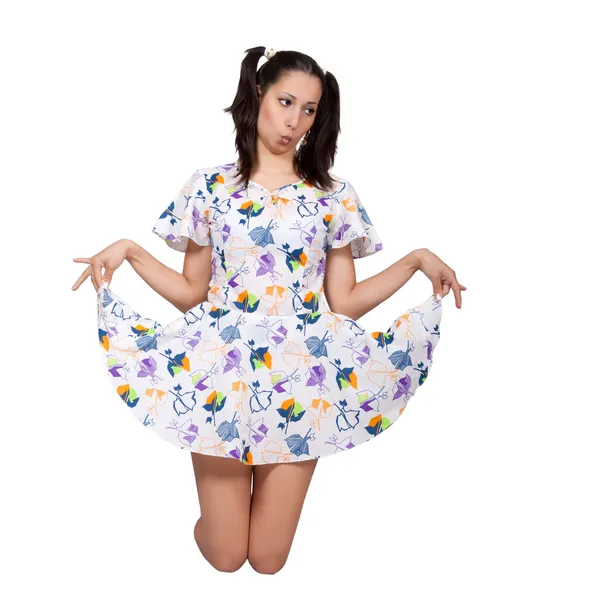 Una chica con coletas en vestido retro colorido —  Fotos de Stock