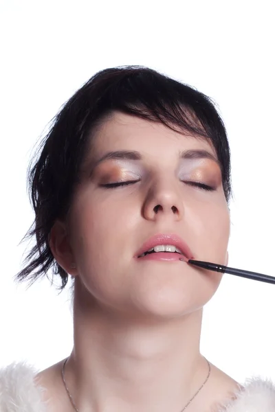 Woman paints lips — Stock Photo, Image