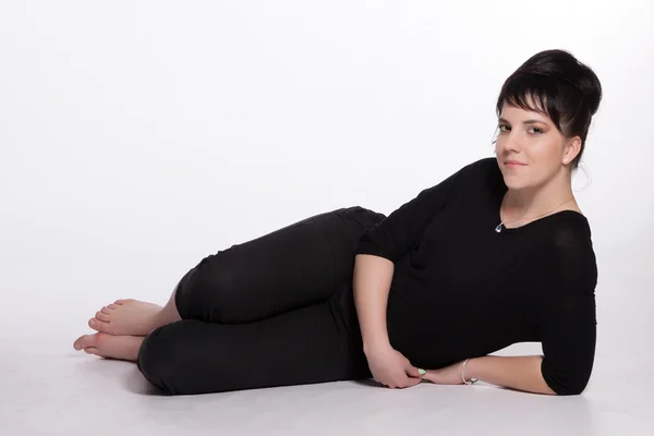 Young woman in black — Stock Photo, Image