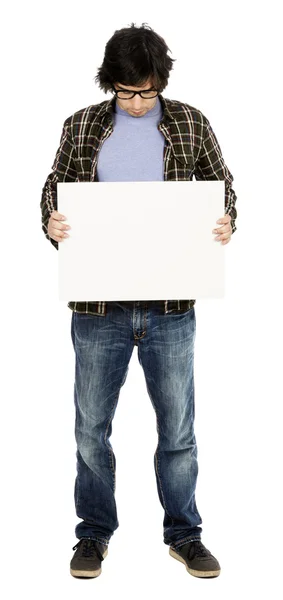 Smiling Casual Guy Holding Sign — Stock Photo, Image