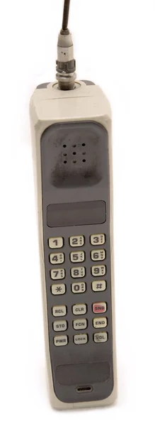 Geïsoleerde oude en vuile cellphone — Stockfoto