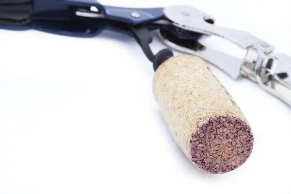 Bottle opener with a cork attached to it — Stock Photo, Image