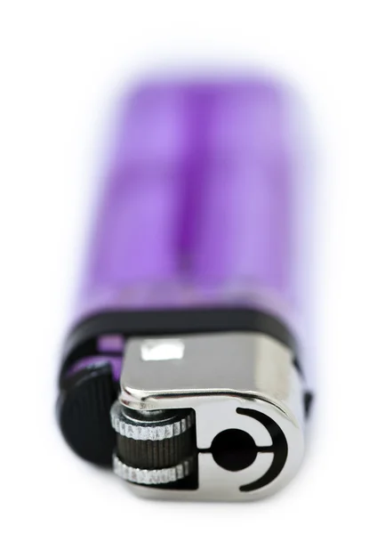 Фиолетовая зажигалка — стоковое фото