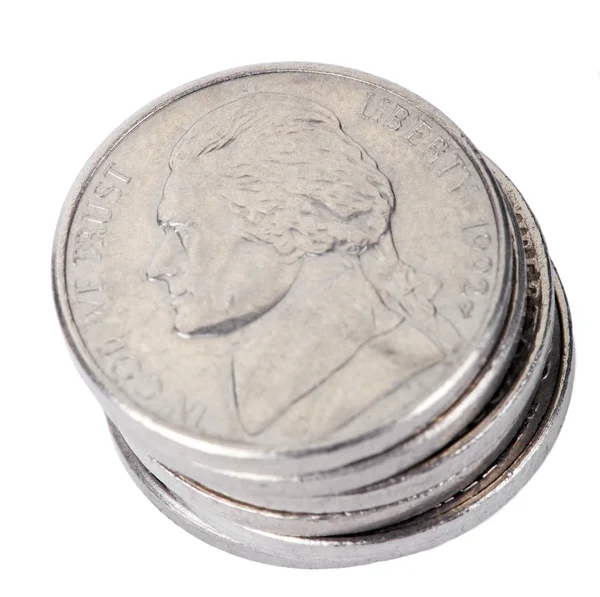 Pilha isolada de moedas de níquel — Fotografia de Stock