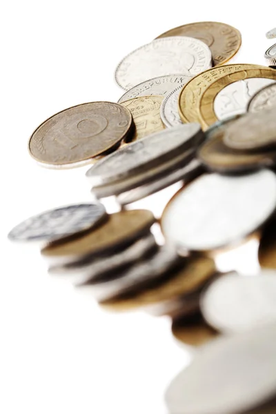 Münzen Makrohintergrund auf weißem Hintergrund — Stockfoto