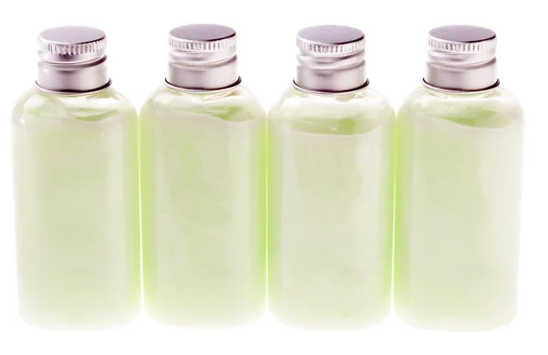 Botellas de loción verde aisladas — Foto de Stock