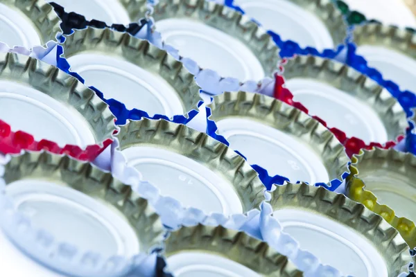 Five rows of metal bottle caps — Stock Photo, Image
