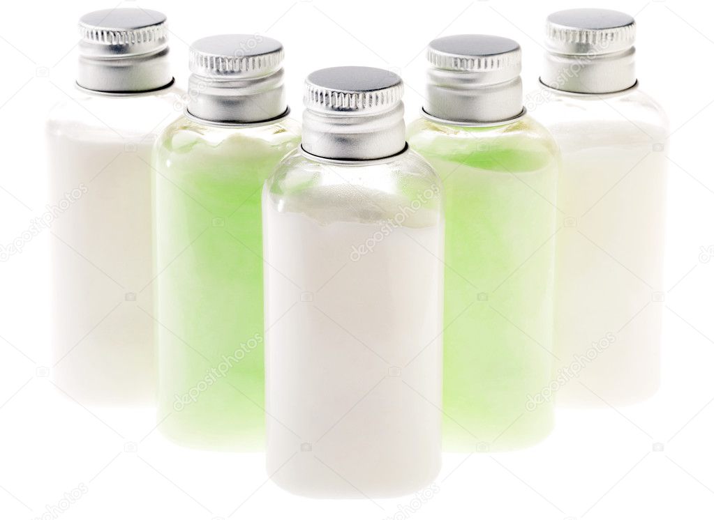 Isolated Green and White Lotion Bottles