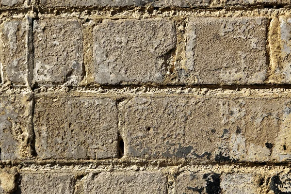 Ruige bakstenen muur - close-up — Stockfoto