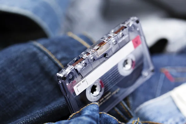 Audio cassette op denim — Stockfoto