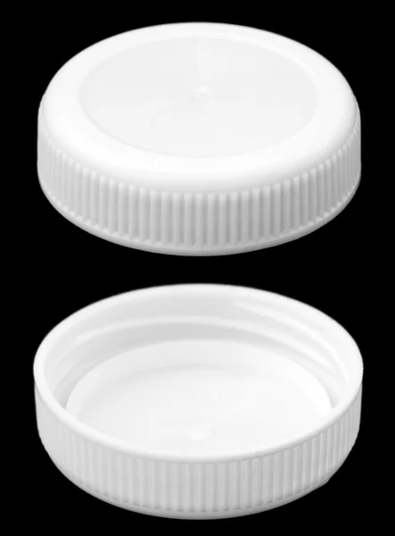 Wo sides of a white plastic bottle cap — Stock Photo, Image