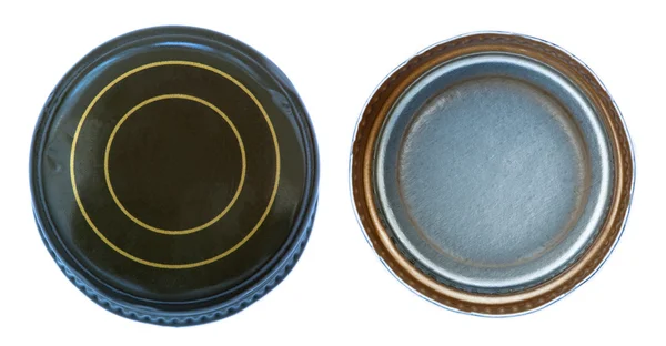 Twee zijden van een groene metalen kroonkurk — Stockfoto