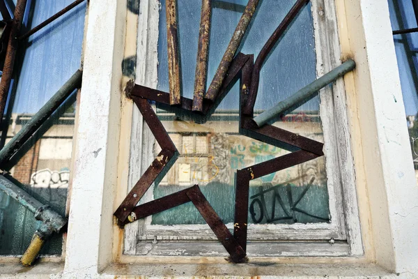 Artistic Star Shaped Industrial Window Bars — Stock Photo, Image