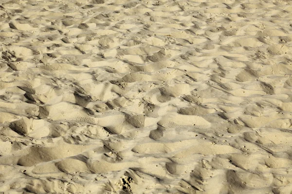 Hautnah auf einem Flecken Sand am Strand. Der Sand wurde umgedreht — Stockfoto