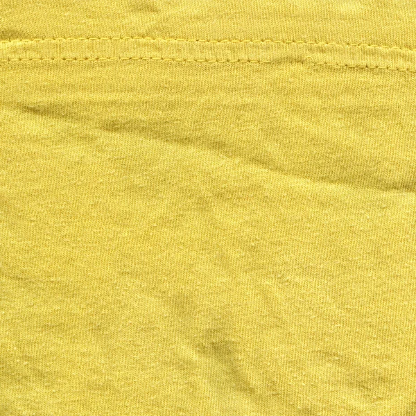 Textura de tecido de algodão - Amarelo brilhante com costuras — Fotografia de Stock