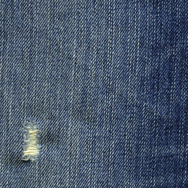 Denim tyg textur - slitna blå — Stockfoto