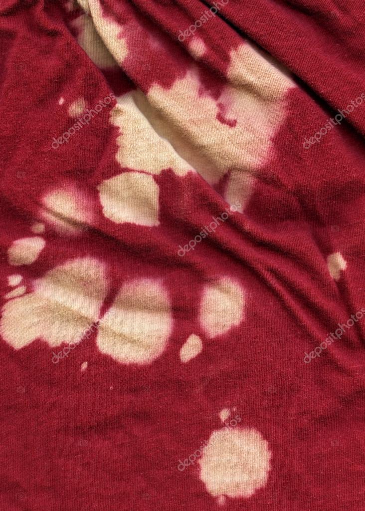 Cotton Fabric Texture - Red with Bleach Stains Stock Photo by