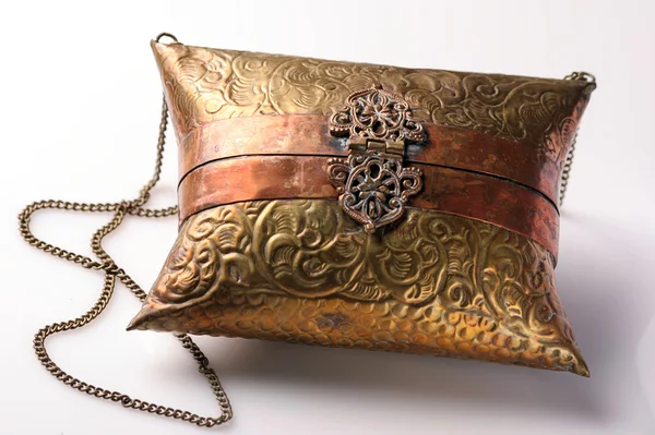 Bolsa de bronze vintage em fundo branco — Fotografia de Stock