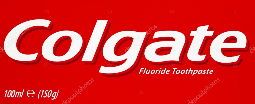 Tel-Aviv, Israel - March, 20th 2011. Part of a red and white cardboard pack of Colgate Fluoride Toothpaste, extreme macro on the logo.