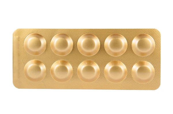 Gold aluminum blister pack on white show medicine concept — Stock Photo, Image