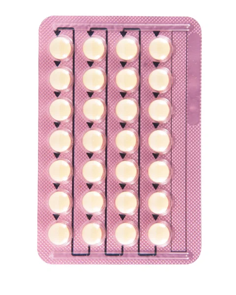 Contraceptive pill in transparent blister pack — Stock Photo, Image