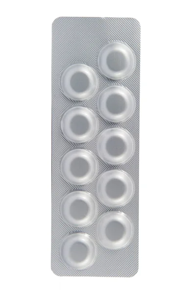 Embalagem blister de alumínio sobre fundo branco — Fotografia de Stock