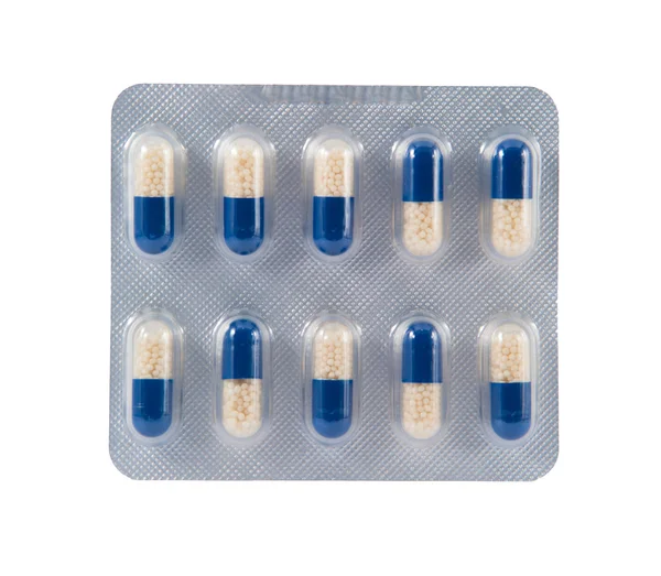 White pellet in capsule on blister pack — Stock Photo, Image