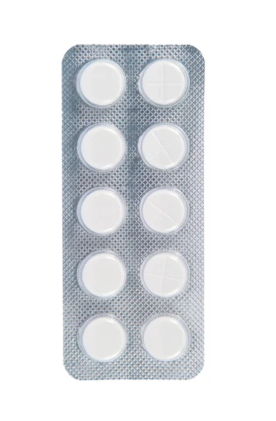 Białe tabletki w przezroczyste opakowanie blister — Zdjęcie stockowe