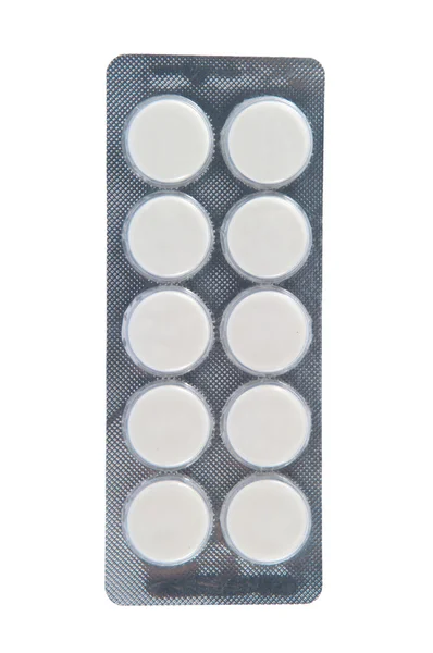 Weiße Tablette in transparenter Blisterverpackung — Stockfoto