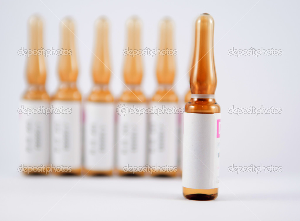 Brown injection ampule show medicine background