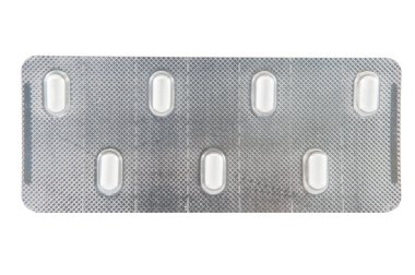 şeffaf blister kutu içinde küçük beyaz kapsül