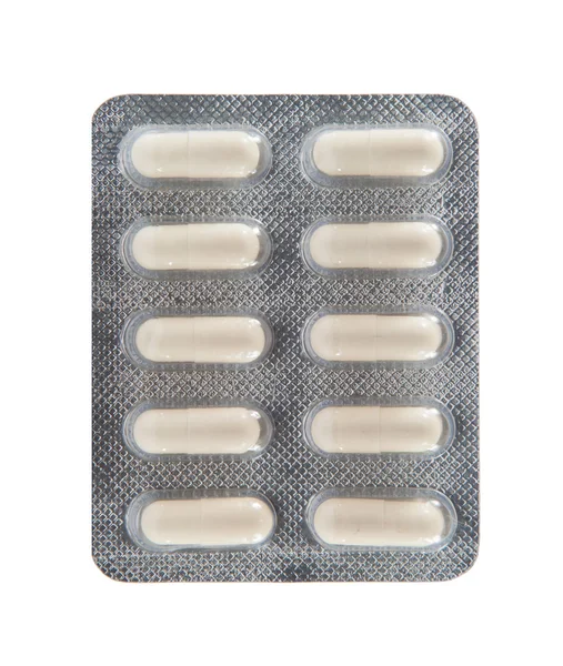 White capsule in transparent blister pack — Stock Photo, Image