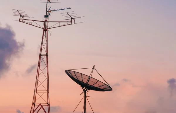 Satellite dish and radio receiver on sky background — Stock Photo, Image