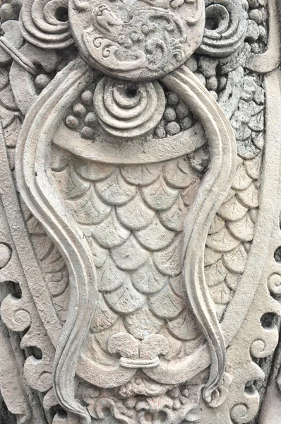 Texture fermée sur stutue en wat pho — Photo