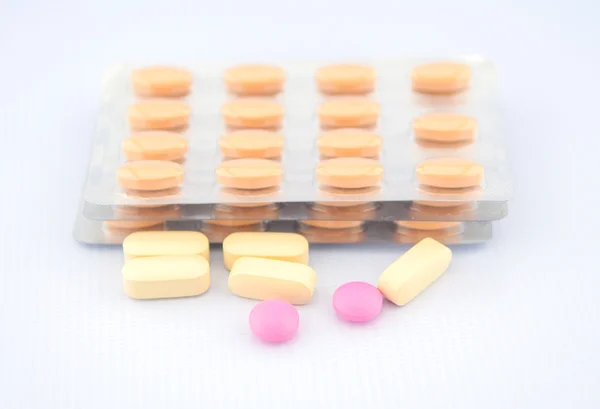 Tablet and blister pack background — Stock Photo, Image