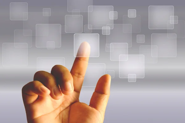 Prst dotýká průhlednou digitální dotyková obrazovka Stock Fotografie