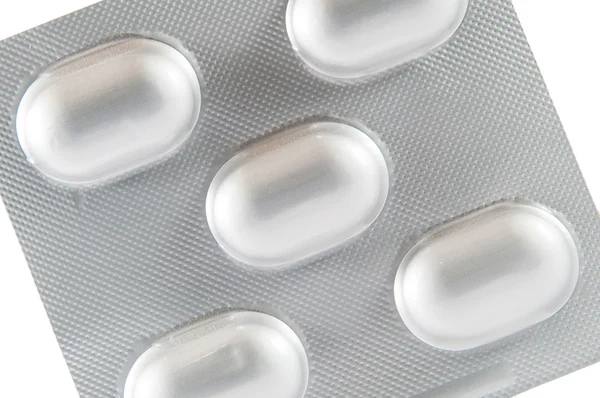 Закрытый таблетки медицины в алюминиевом блистере пакет — стоковое фото