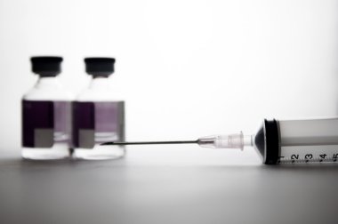 Tek kullanımlık şırınga ve iğne ampul arka plan